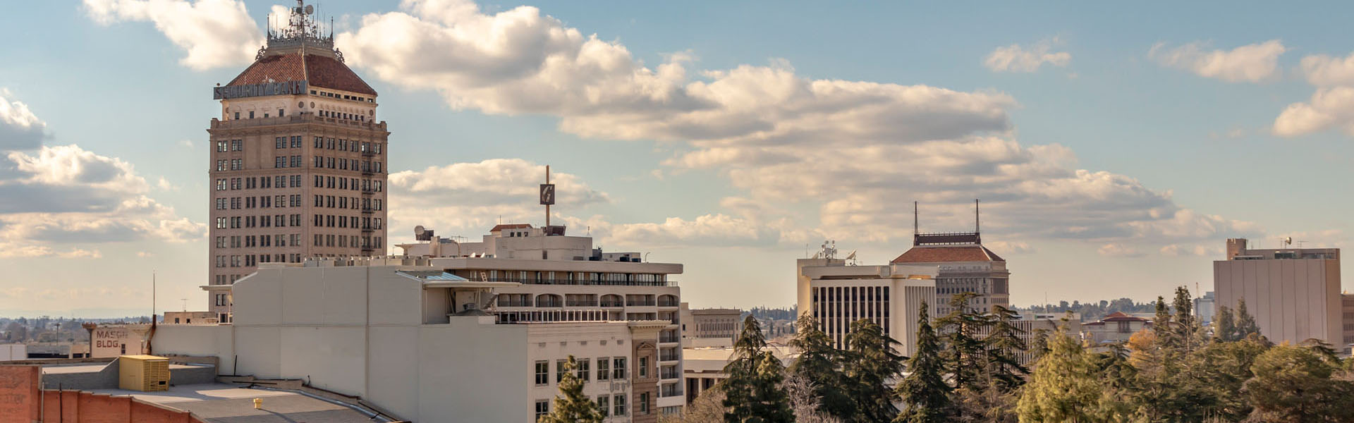 Neon color image of a band playing and people singing along