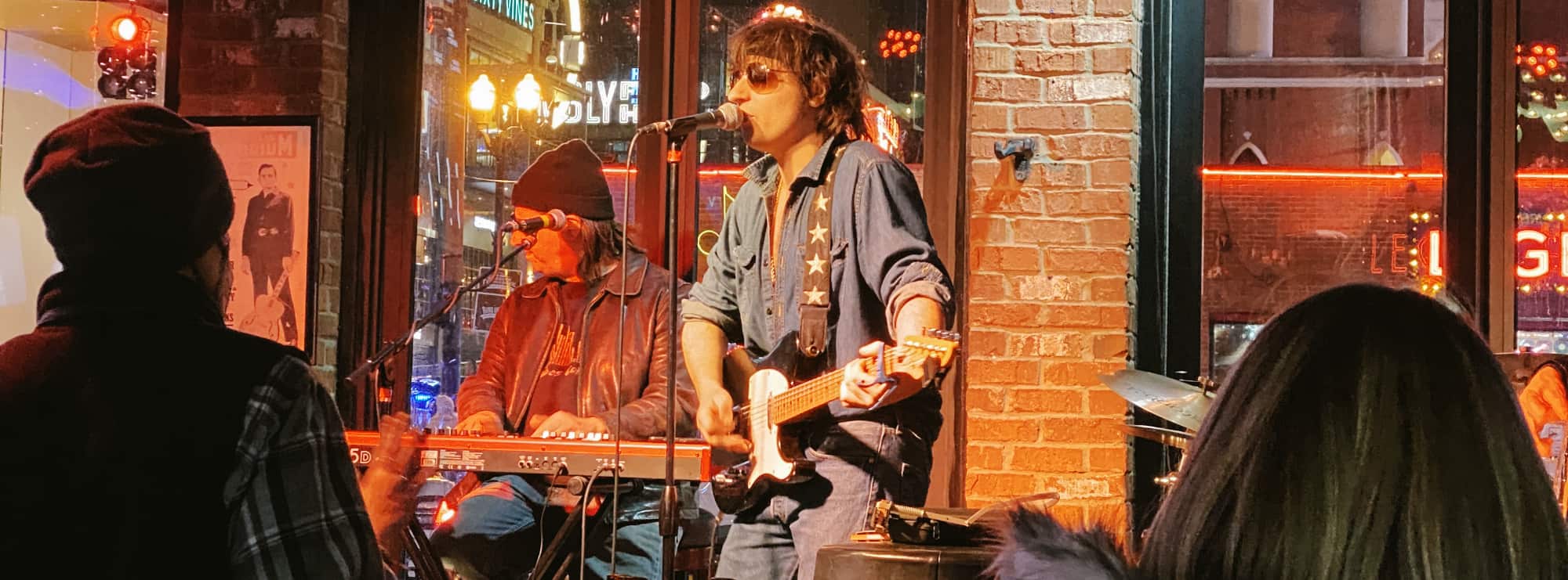 bar singer on guitar in Fresno