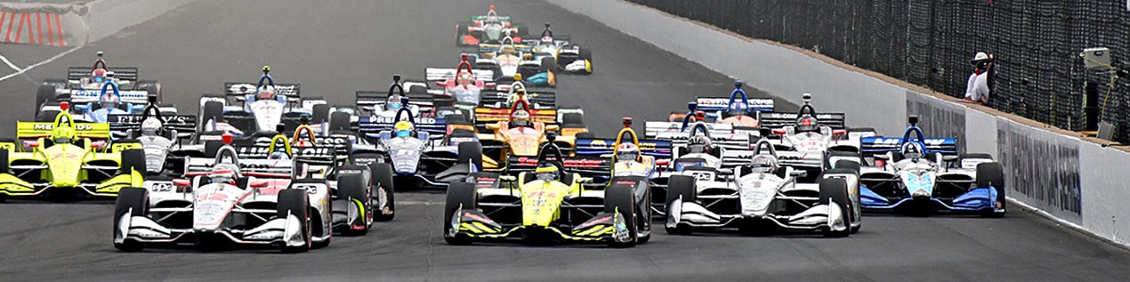 indy cars racing to through the start line Fresno